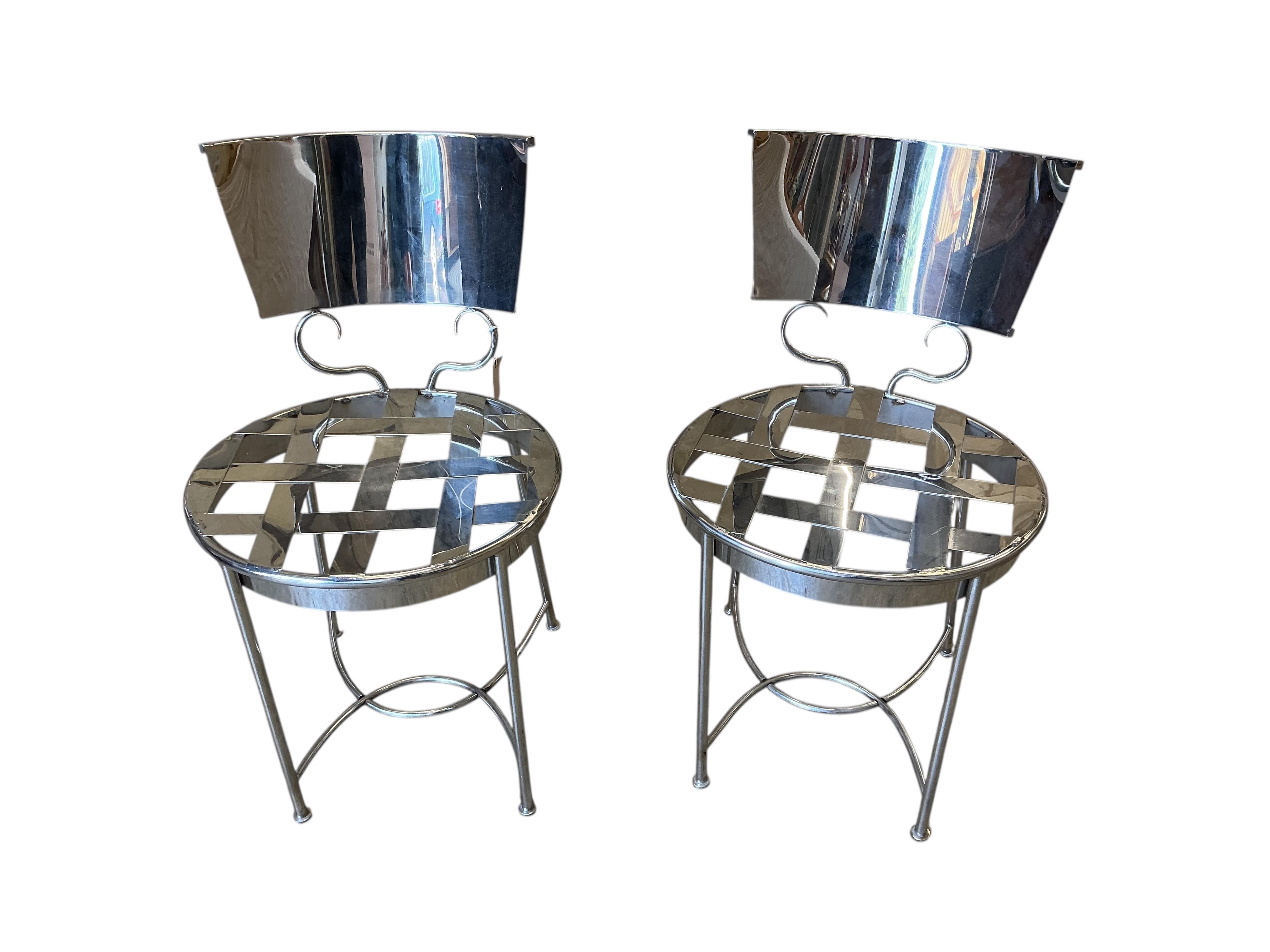 A pair of contemporary chrome chairs, height 80cm
